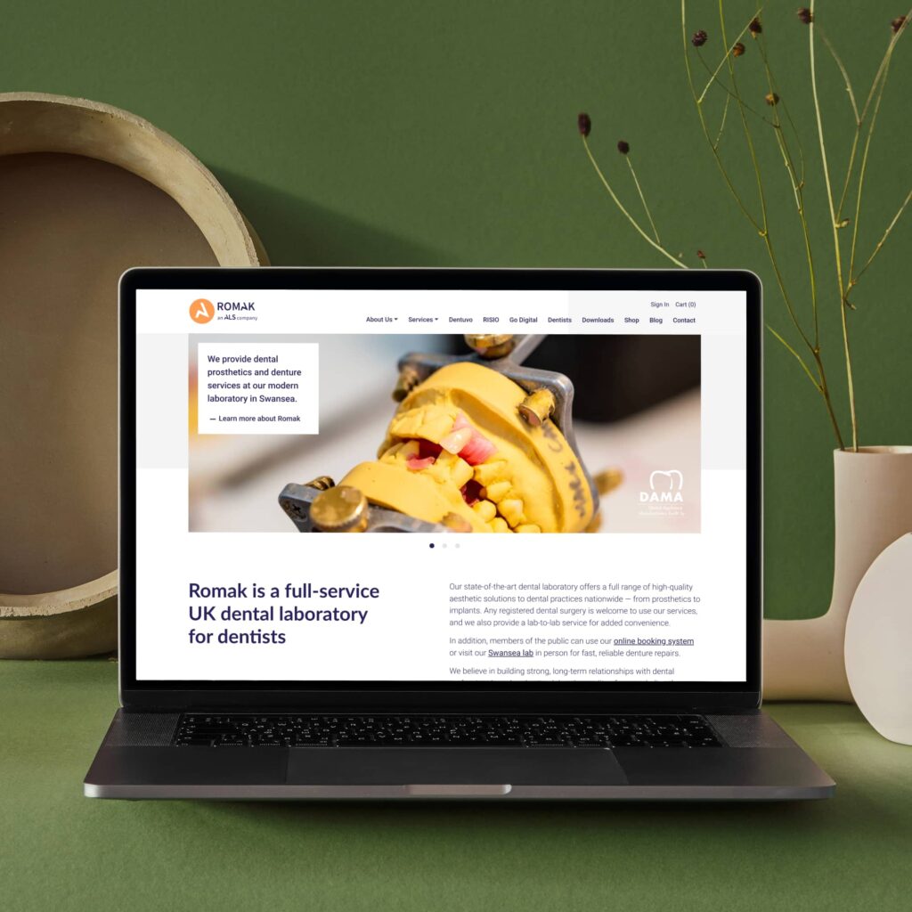 Romak Dental Laboratory WordPress Case Study, featuring dental solutions and eCommerce shop.